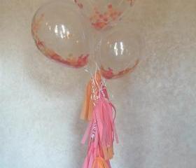 1 Set of 3 Clear balloons filled w/ confetti. 1 Yard of Tissue paper tassel.